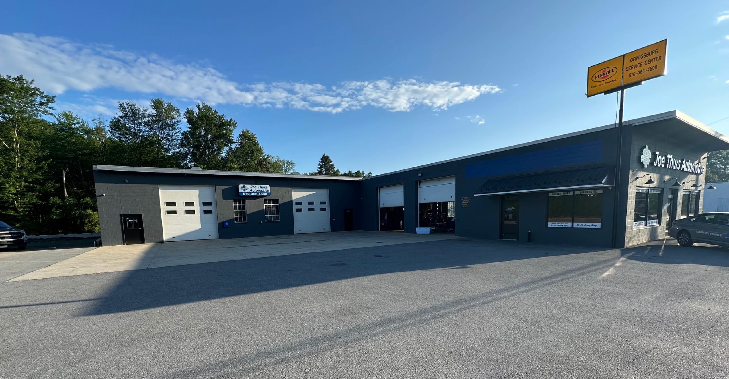 Automotive service center building exterior view.